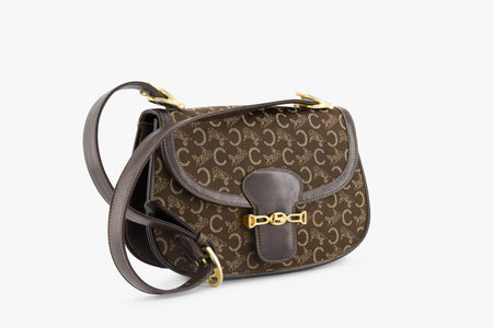 Measurements
Width: 25 cm
Height: 18 cm 
 Depth: 7 cm 
 Strap drop 35 cm

Condition
Good

Inclusions
 Luxe Indulgence dust bag