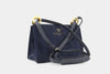 Measurements
Width: 26 cm 
Height: 18 cm
Depth: 12

Condition
Very good

Inclusions
Luxe Indulgence dustbag